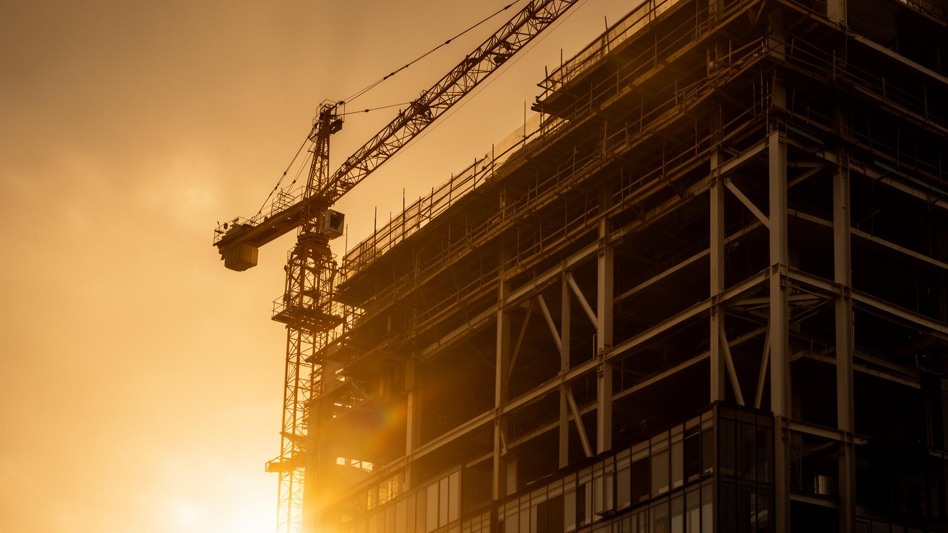 Tower under construction at golden hour